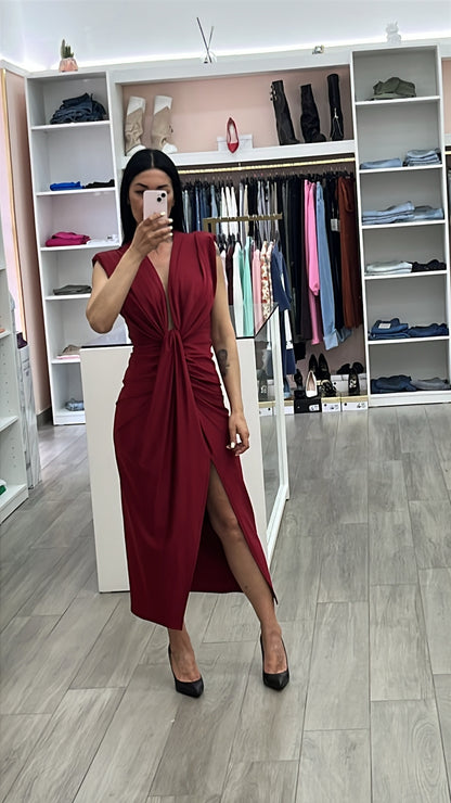 Abito zaila tessuto licra lucido elastico drappeggiato con fusciacca in due varianti di colore bordeaux e nero