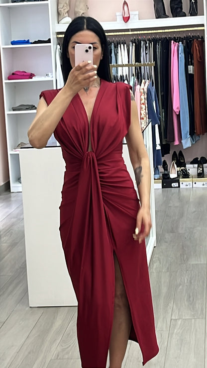Abito zaila tessuto licra lucido elastico drappeggiato con fusciacca in due varianti di colore bordeaux e nero