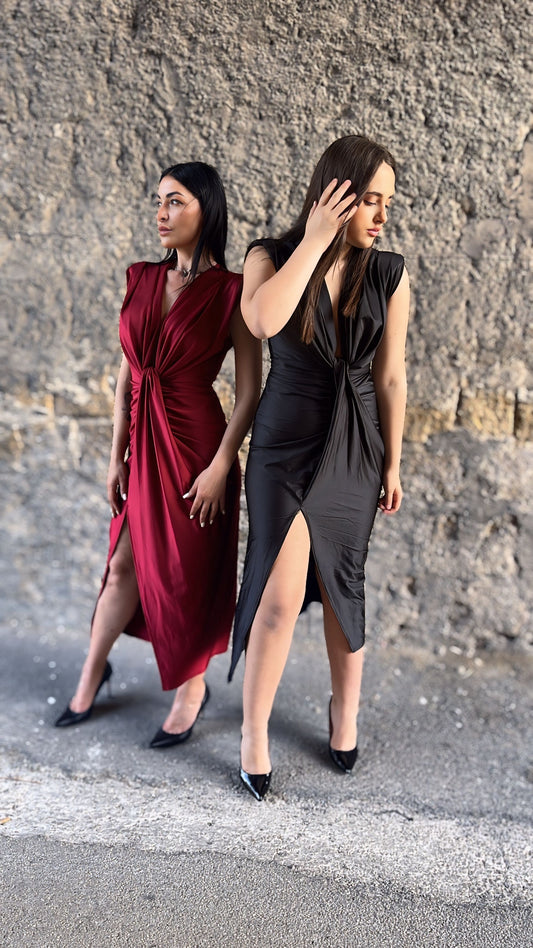 Abito zaila tessuto licra lucido elastico drappeggiato con fusciacca in due varianti di colore bordeaux e nero